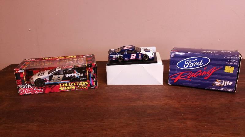 lot 91 image: Racing Champions and Ford Catalog Exclusive Die Cast Cars