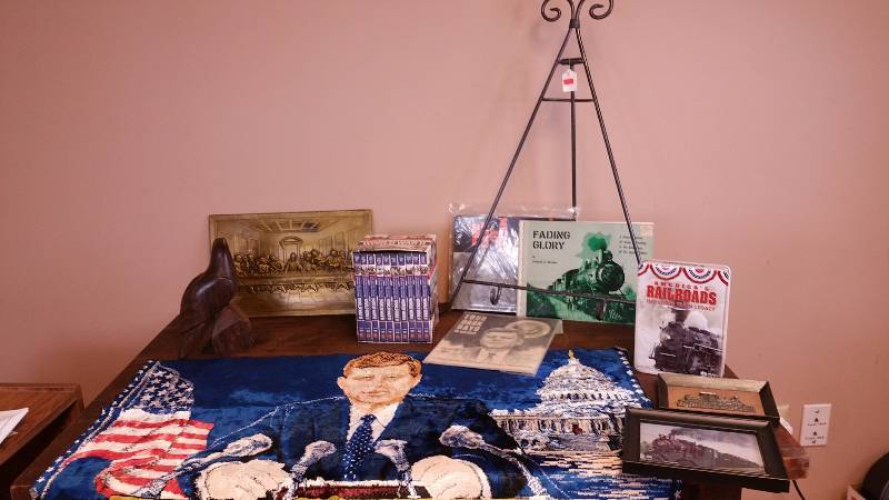 lot 109 image: JFK Tapestry, JFK Photo History Magazine, WWII DVD Set, Railroad Items, Easel, Etc.