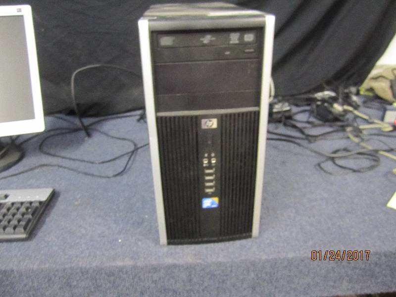 lot 11 image: HP 6000 PC, powers on...