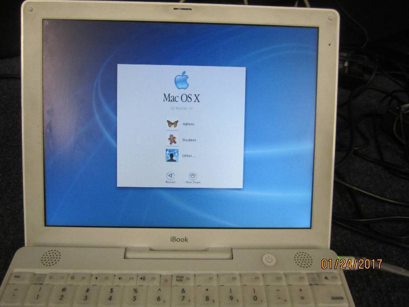 lot 17 image: Apple iBook , boots up, no power co...