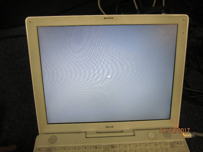 lot 19 image: Apple iBook , powers up, no power c...