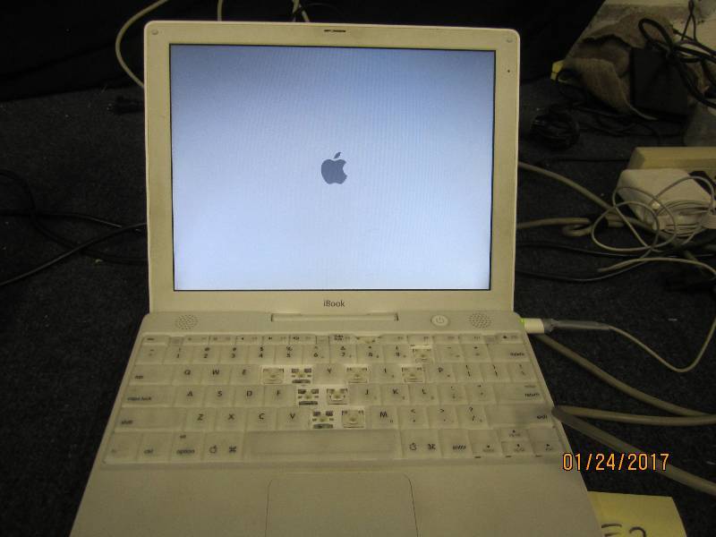 lot 20 image: Apple iBook , powers up, no power c...