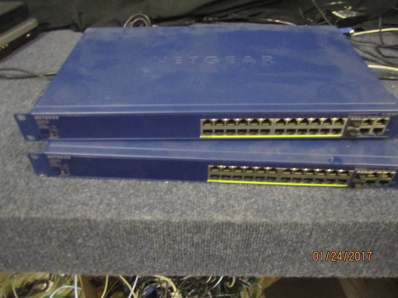 lot 31 image: Lot of 2 NetGear FS728TP ProSafe 24...