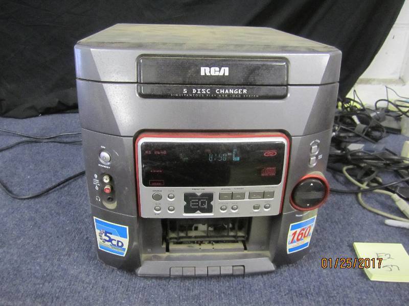 lot 57 image: RCA 5 Disc Changer, powers on...