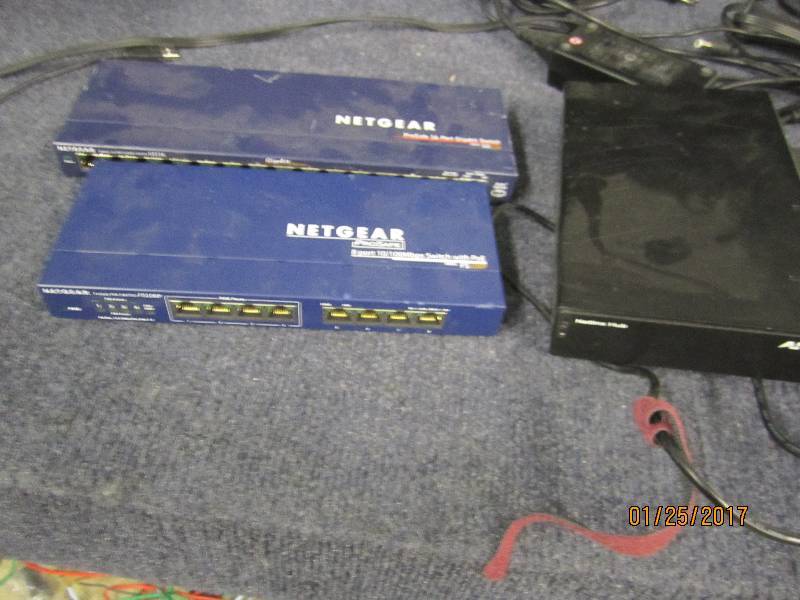 lot 63 image: Lot of 2 NetGear Switches, AMX Netl...