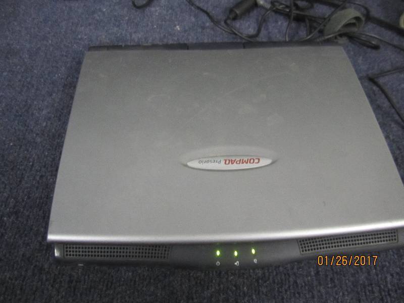 lot 105 image: Compaq Presario 1200 Laptop Boots t...