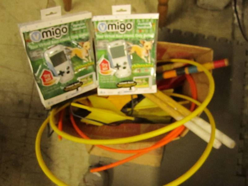 lot 182 image: 2 Vmigo Portable Handheld Pet Game,...