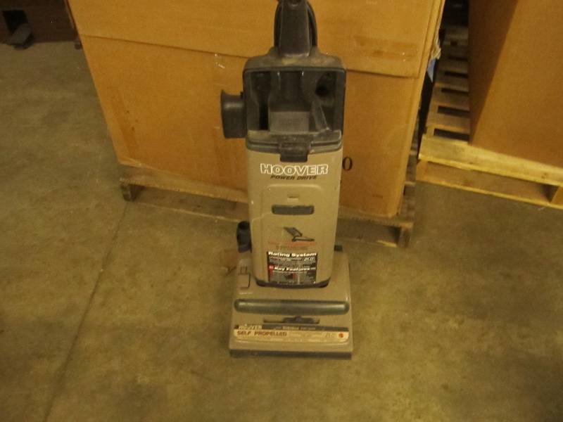 lot 200 image: Hoover Power Drive Vacuum, powers o...