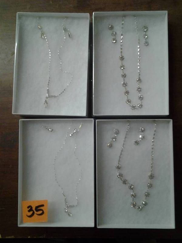 lot 35 image: 4-Silver Tone Necklace & Pierced Earring Sets