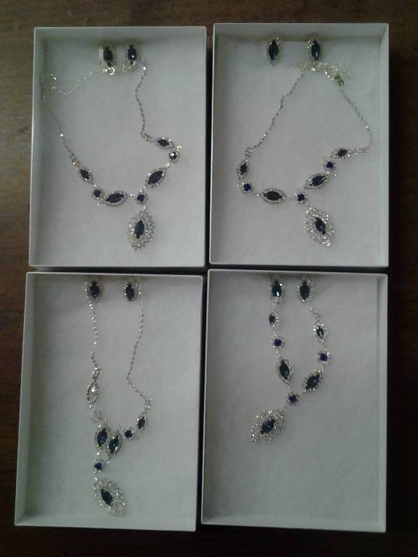 lot 36 image: 4-Silver Tone Necklace & Pierced Earring Sets With Blue Stones