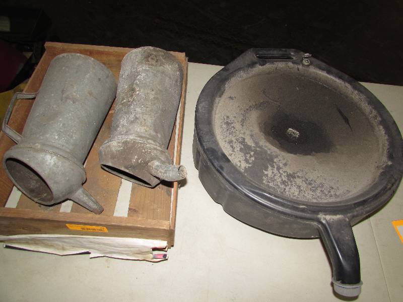 Oil catch can and two old oil cans