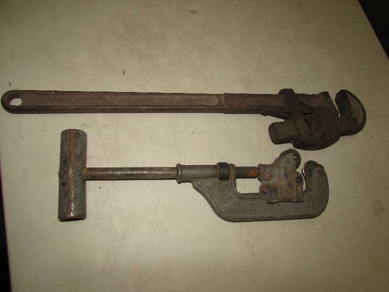 Large Pipe Wrench and Pipe Cutter