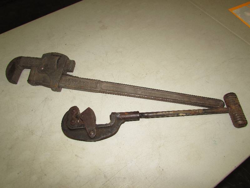 Large Pipe Wrench and Pipe Cutter