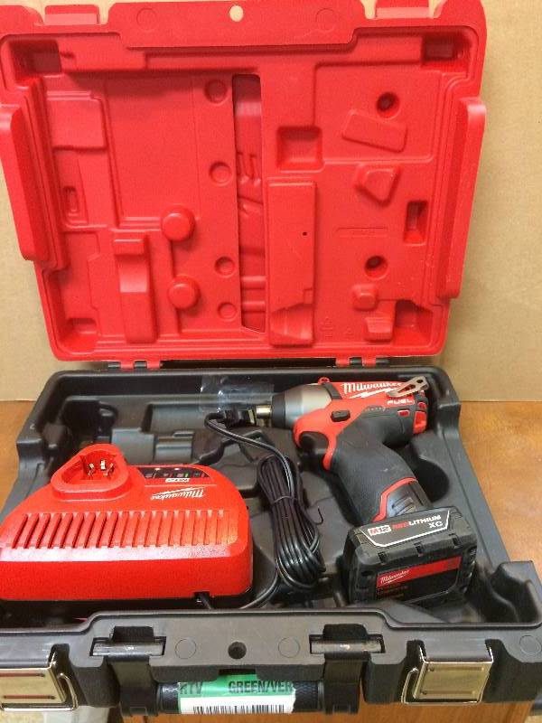 lot 53 image: Milwaukee M12 Fuel 12-Volt Brushless Lithium-Ion 14 in. Hex Impact Driver Kit not used