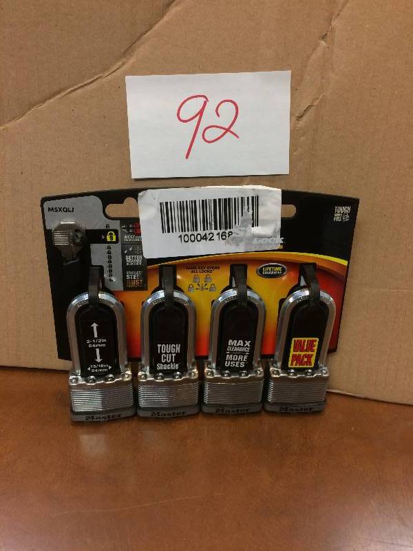lot 92 image: Master Lock Magnum 2 in. Laminated Steel Padlock with 2-12 in. Shackle (4-Pack) New