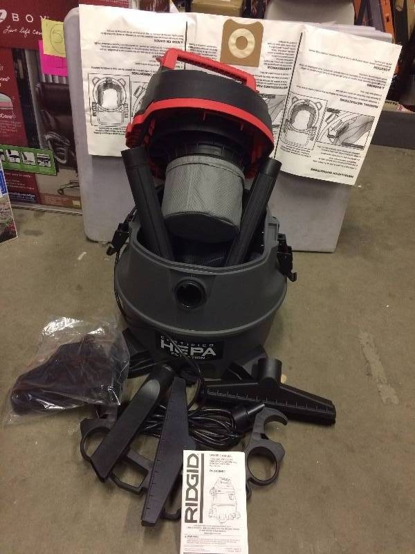 lot 139 image: Ridgid Model RV2400HF0 14 gal. HEPA Wet Dry Vac Never used