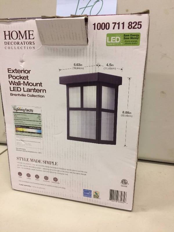lot 170 image: Home Decorators Pocket Wall Mount LED Lantern Never used