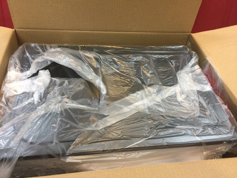 lot 12 image: Black and Decker 0.7 CU FT Microwave Oven open box never used