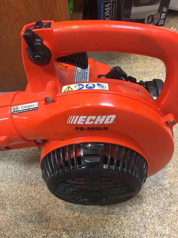 lot 15 image: Echo 165 MPH 391 CFM 25.4cc Low Noise Handheld Gas Leaf Blower in like new condition