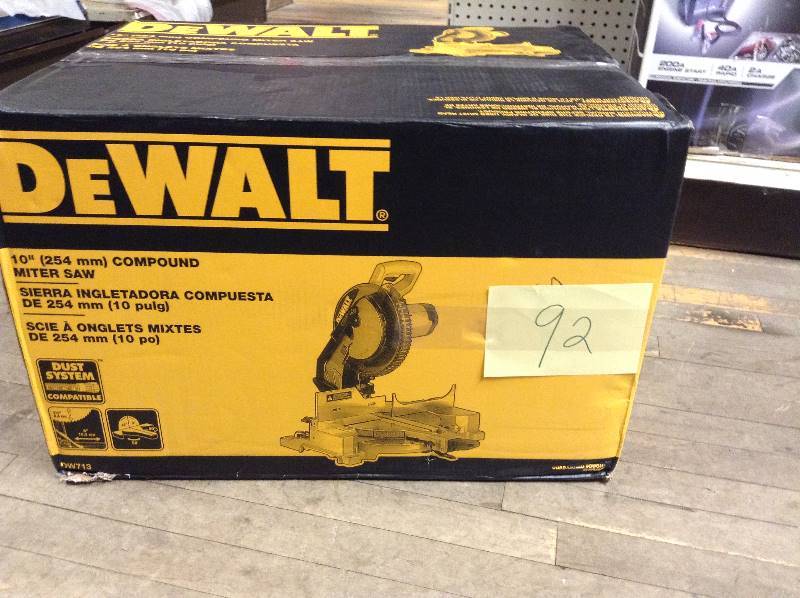 lot 92 image: Dewalt 15 Amp 10 in. Compound Miter Saw new