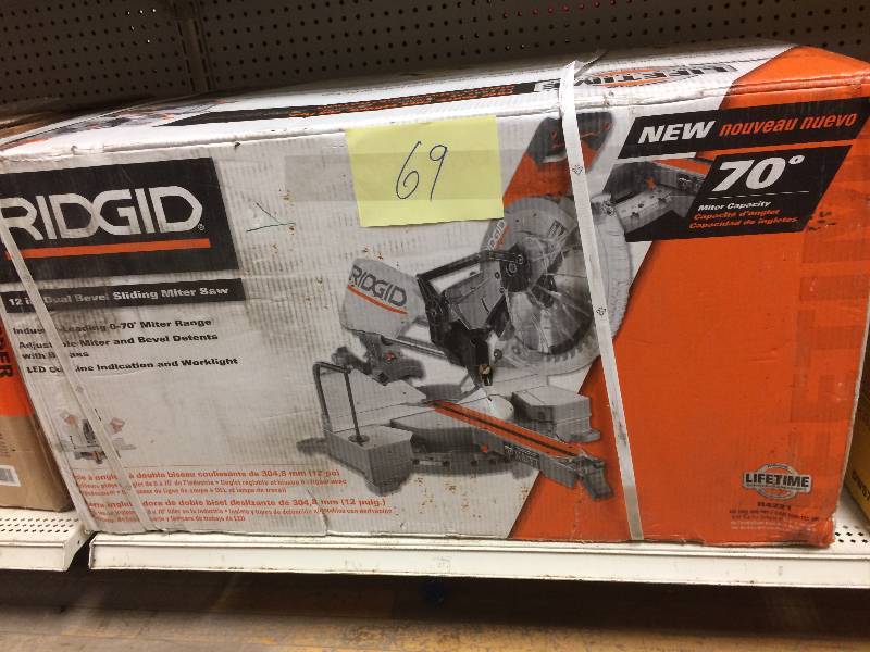 lot 69 image: Ridgid 15 Amp 12 in. Corded Dual Bevel Sliding Miter Saw with 70 Degree Miter Capacity New