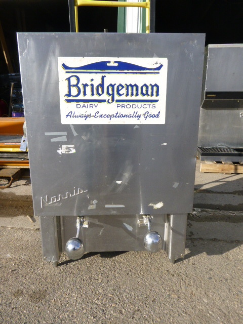 lot 72 image: Norris Milk Dispenser
