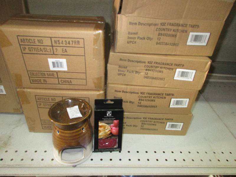 4 wax burners and 4 cases of wax