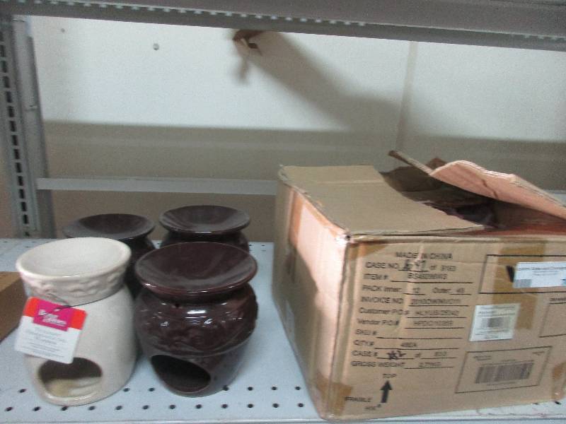 4 wax burners and 1 box of bulk wax