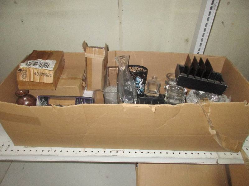 assorted box of tea light stuff and fragrance  incense and vases