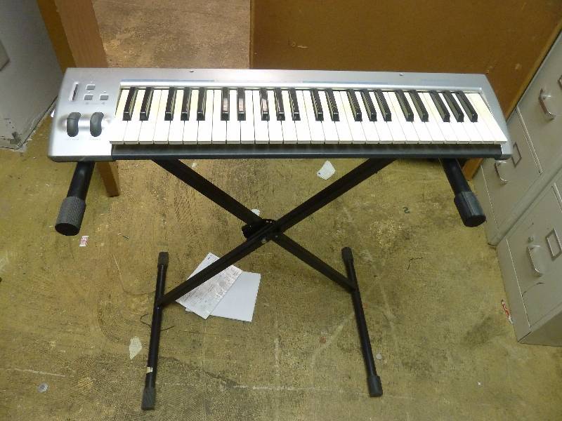lot 350 image: M-Audio Keyboard with Stand