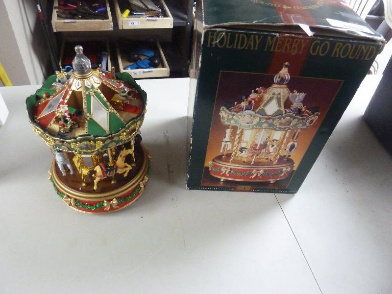lot 402 image: Holiday Merry Go Round