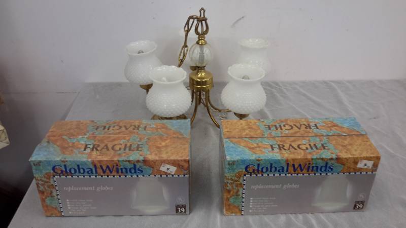 lot 25 image: Chandelier with 8 replacement globes new in the box