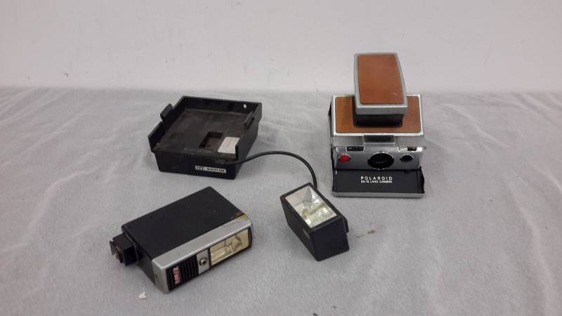 lot 56 image: Polaroid sx-70 land camera