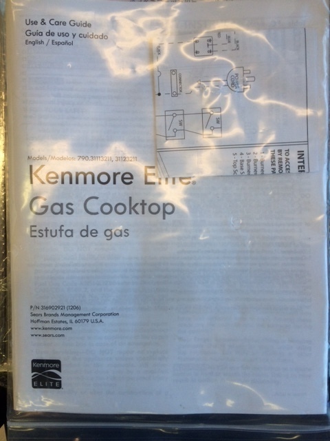 lot 28 image: Kenmore Stainless Steel Cooktop