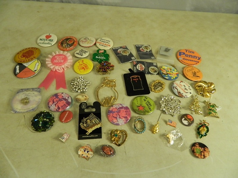 lot 23 image: Pins, Buttons, and More