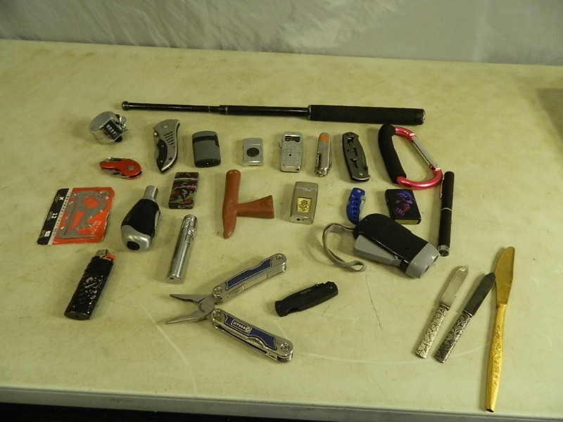 lot 27 image: Knives, Lighters, and More