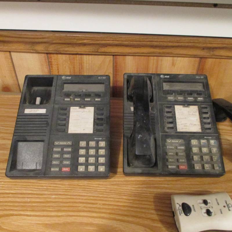 lot 41 image: (2) Full Feature Phones (4) Standard Phones (1) Phone Volume Control