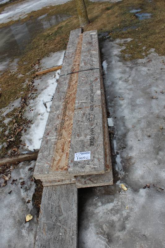 lot 1869 image: Lot of (12) 2 x 12 x 12 ft. Pressed Wood