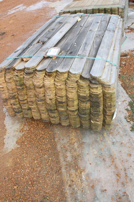 lot 1823 image: Lot of (360) 1 x 4 x 6 ft. Treated Dog Ear Fence