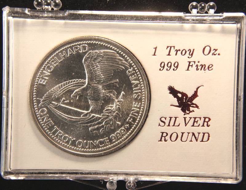 1 TROY OZ. .999 FINE SILVER ROUND 1985 ENGELHARD THE AMERICAN PROSPECTOR IN STAMFORD BANK HOLDER