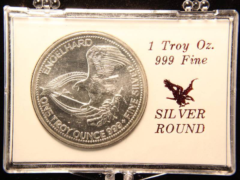 1 TROY OZ. .999 FINE SILVER ROUND 1985 ENGELHARD THE AMERICAN PROSPECTOR IN STAMFORD BANK HOLDER