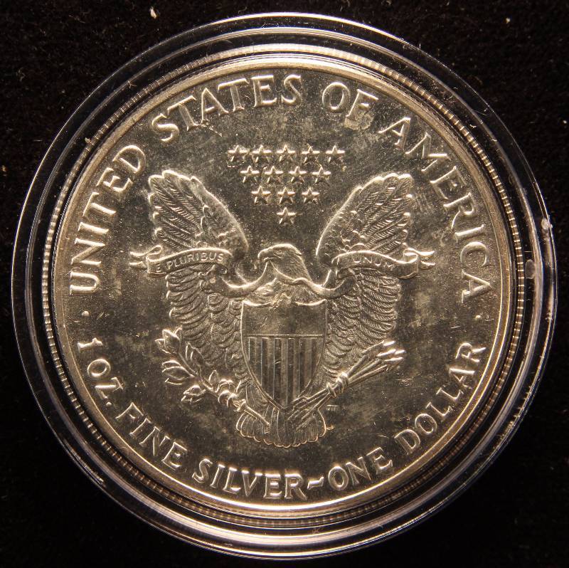 1987 AMERICAN SILVER EAGLE 1 TROY Oz. .999 FINE SILVER DOLLAR IN AIRTITE HOLDER
