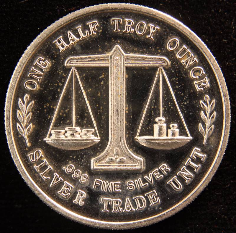 12 TROY OZ. .999 FINE SILVER JESSE HELMS SILVER TRADE UNIT