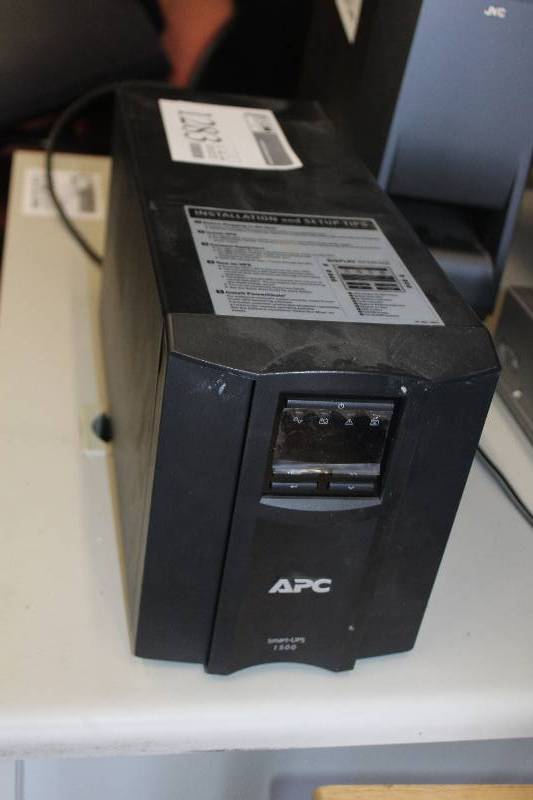 lot 1283 image: APC Smart-UPS 1500 Battery Backup and Power Conditioning