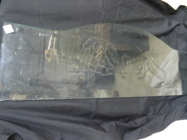 Etched glass designed to go on the ...