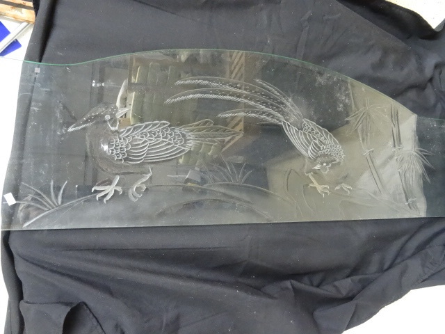 Etched glass designed to go on the ...