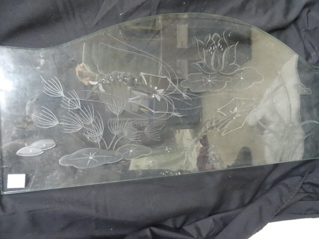 Etched glass designed to go on the ...