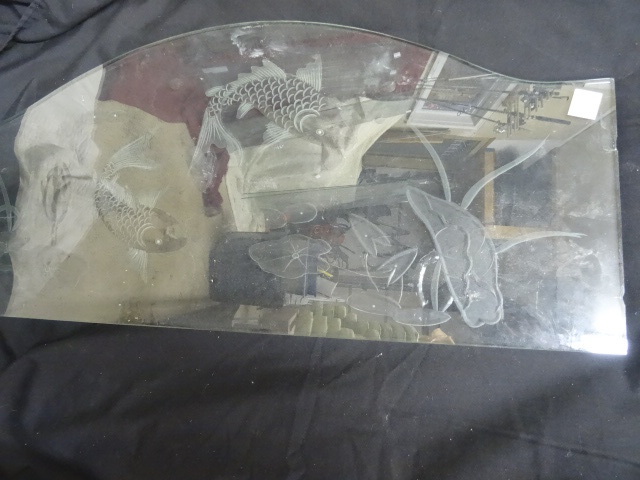 Etched glass designed to go on the ...