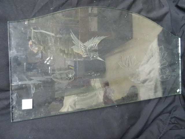 Etched glass designed to go on the ...