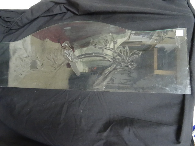 Etched glass designed to go on the ...